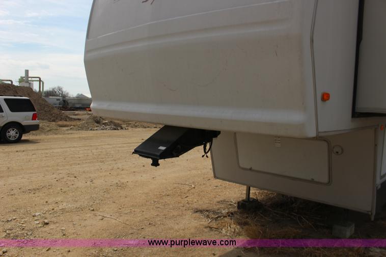 image for item F7633 2005 All American Sport fifth wheel toy hauler camper