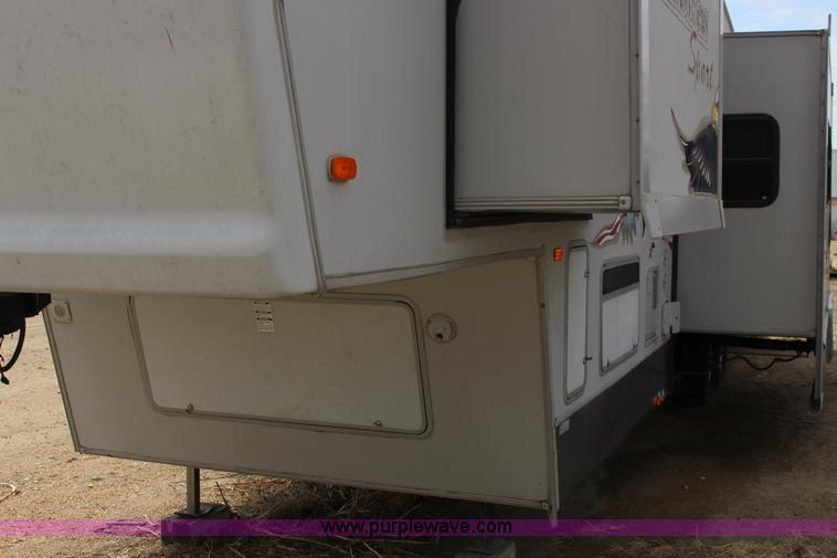image for item F7633 2005 All American Sport fifth wheel toy hauler camper