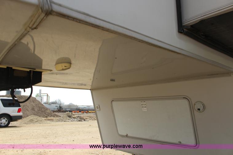 image for item F7633 2005 All American Sport fifth wheel toy hauler camper