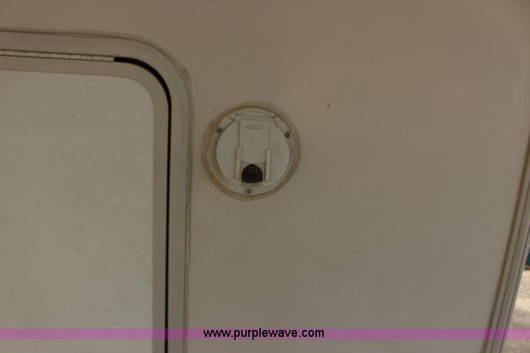 image for item F7633 2005 All American Sport fifth wheel toy hauler camper