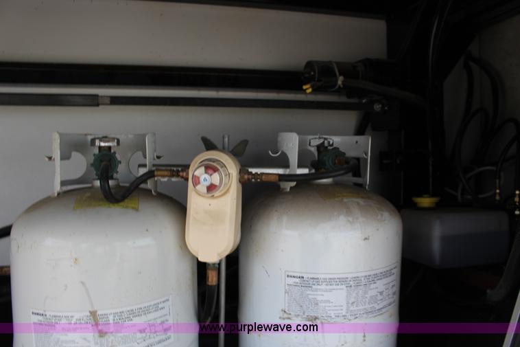 image for item F7633 2005 All American Sport fifth wheel toy hauler camper