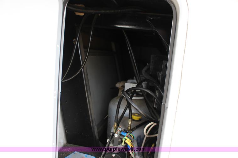 image for item F7633 2005 All American Sport fifth wheel toy hauler camper