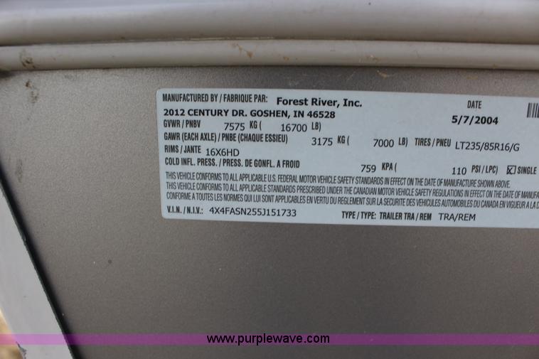 image for item F7633 2005 All American Sport fifth wheel toy hauler camper