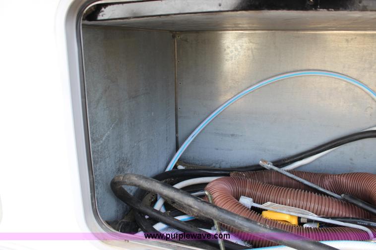 image for item F7633 2005 All American Sport fifth wheel toy hauler camper