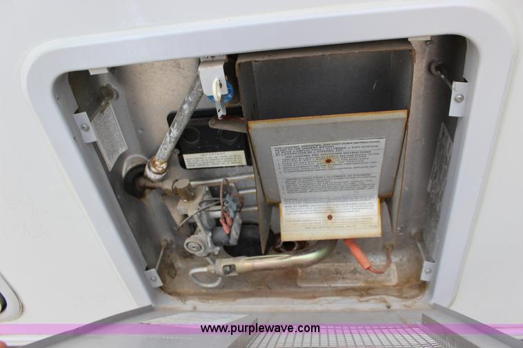 image for item F7633 2005 All American Sport fifth wheel toy hauler camper