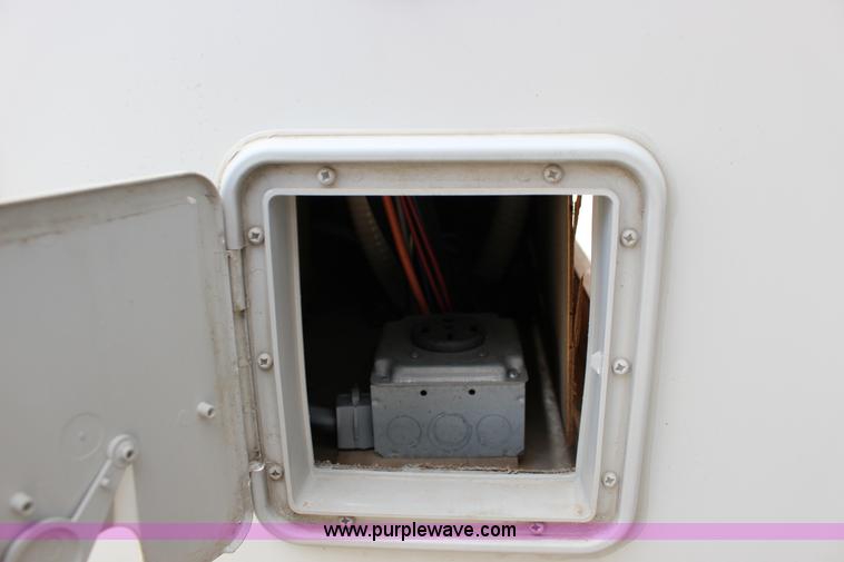 image for item F7633 2005 All American Sport fifth wheel toy hauler camper