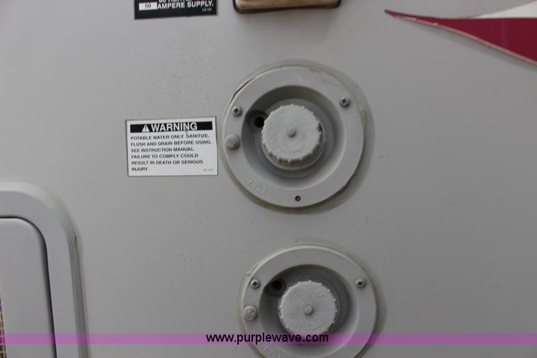 image for item F7633 2005 All American Sport fifth wheel toy hauler camper