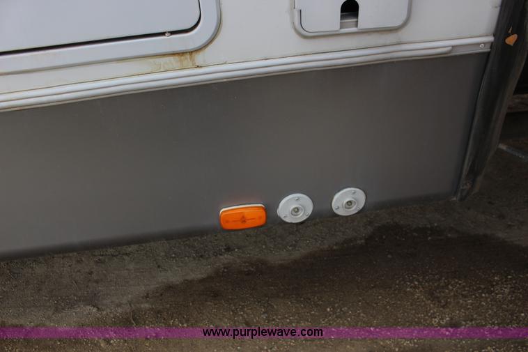 image for item F7633 2005 All American Sport fifth wheel toy hauler camper