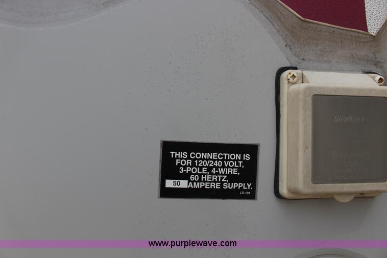 image for item F7633 2005 All American Sport fifth wheel toy hauler camper