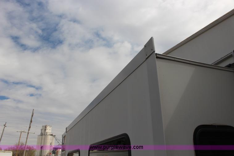 image for item F7633 2005 All American Sport fifth wheel toy hauler camper