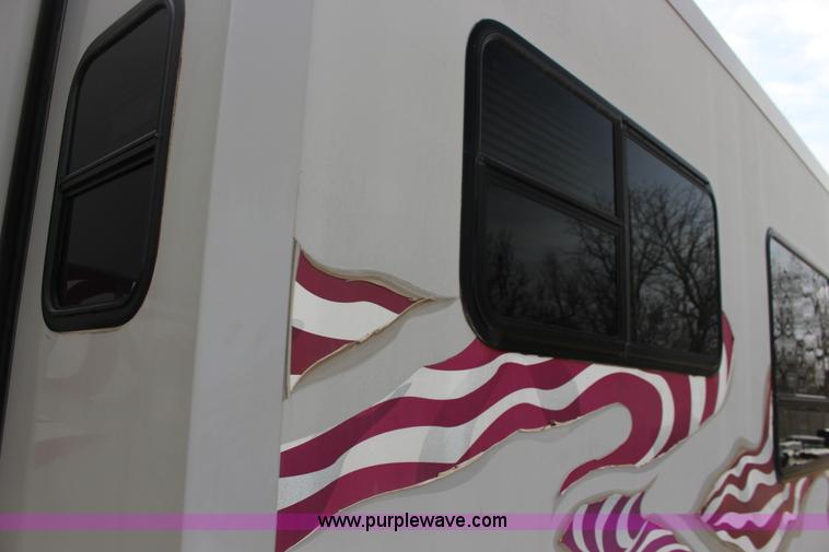 image for item F7633 2005 All American Sport fifth wheel toy hauler camper