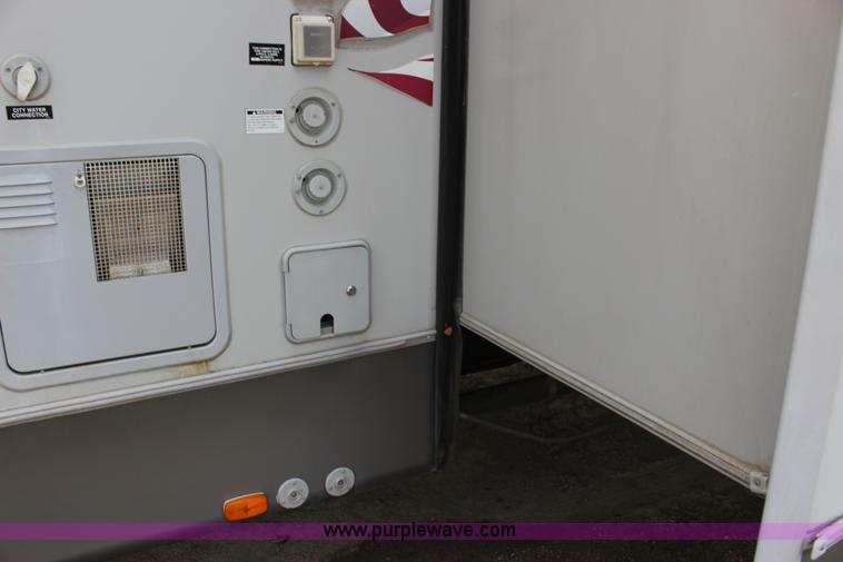 image for item F7633 2005 All American Sport fifth wheel toy hauler camper