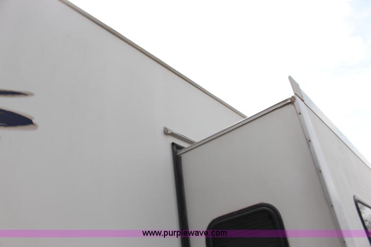 image for item F7633 2005 All American Sport fifth wheel toy hauler camper