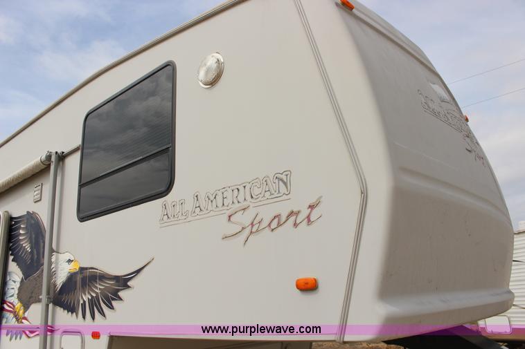 image for item F7633 2005 All American Sport fifth wheel toy hauler camper