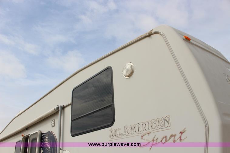 image for item F7633 2005 All American Sport fifth wheel toy hauler camper