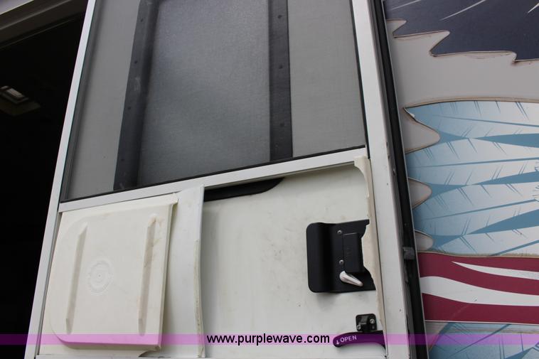 image for item F7633 2005 All American Sport fifth wheel toy hauler camper