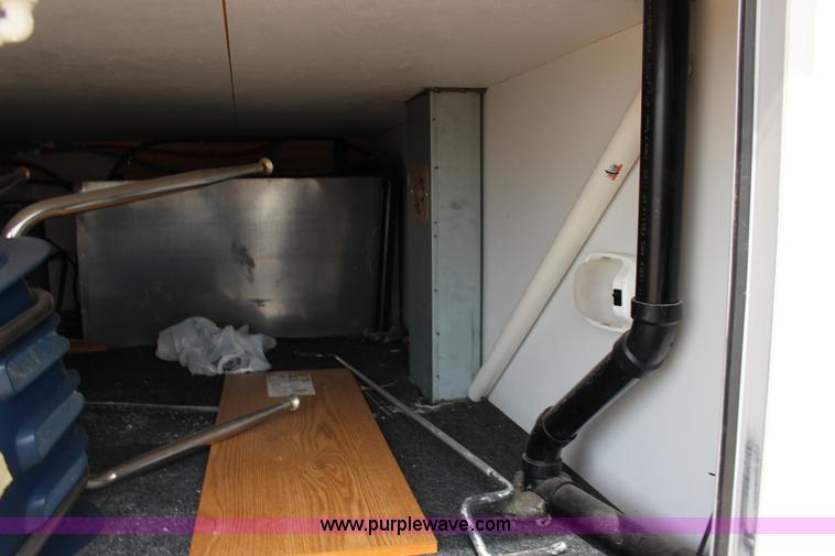 image for item F7633 2005 All American Sport fifth wheel toy hauler camper