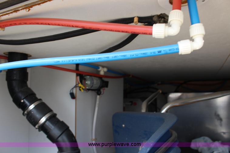 image for item F7633 2005 All American Sport fifth wheel toy hauler camper