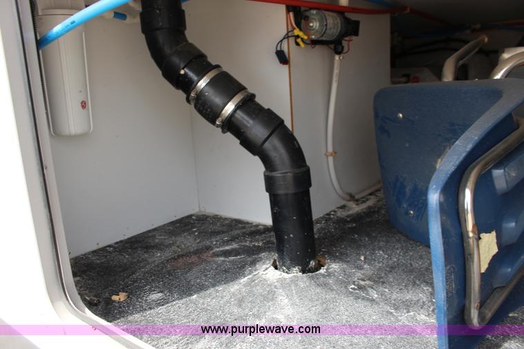 image for item F7633 2005 All American Sport fifth wheel toy hauler camper