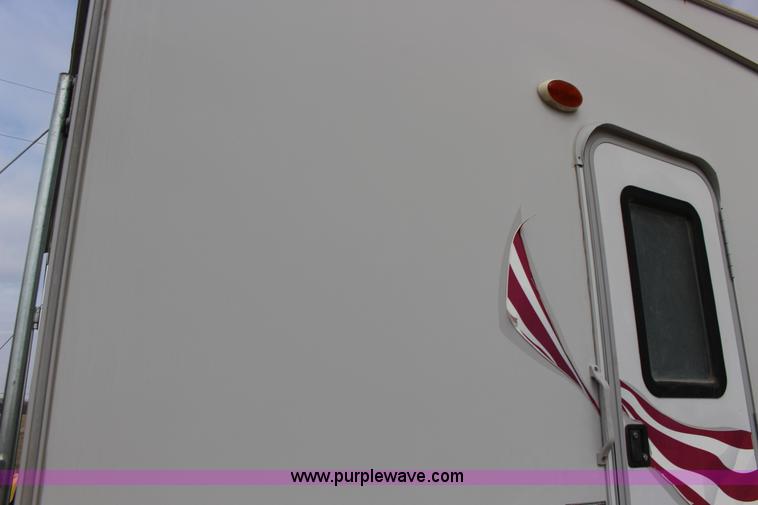 image for item F7633 2005 All American Sport fifth wheel toy hauler camper