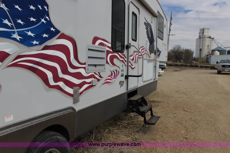 image for item F7633 2005 All American Sport fifth wheel toy hauler camper