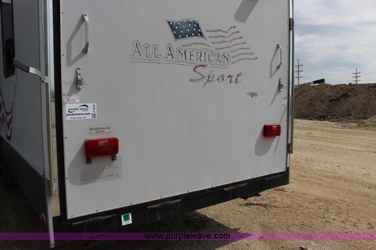 image for item F7633 2005 All American Sport fifth wheel toy hauler camper
