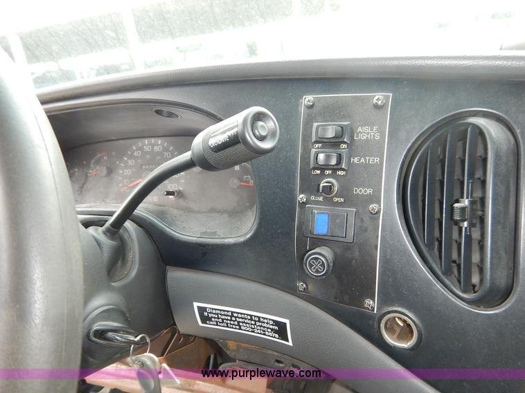 image for item J3985 2003 Ford 801 transit bus
