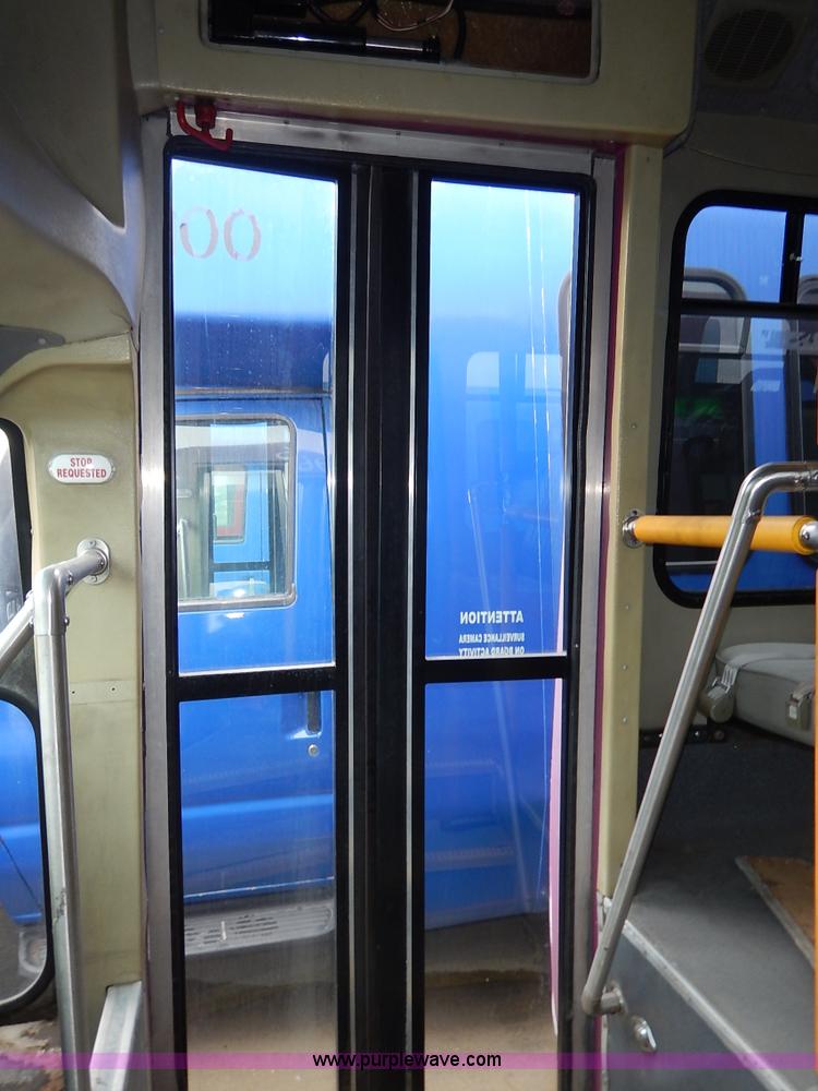 image for item J3985 2003 Ford 801 transit bus