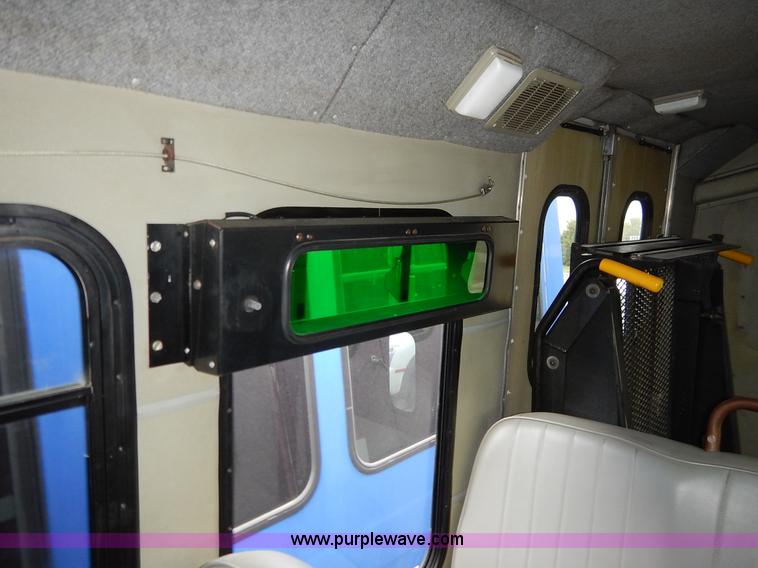 image for item J3985 2003 Ford 801 transit bus