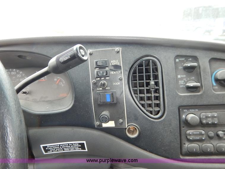 image for item J3987 2003 Ford 801 transit bus