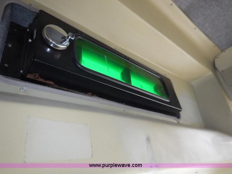 image for item J3987 2003 Ford 801 transit bus