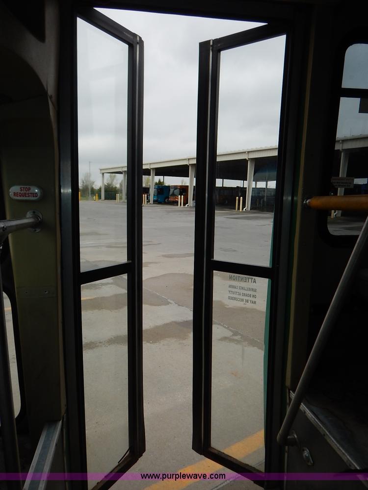 image for item J3987 2003 Ford 801 transit bus