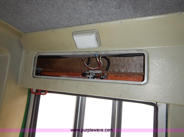 image for item J3987 2003 Ford 801 transit bus