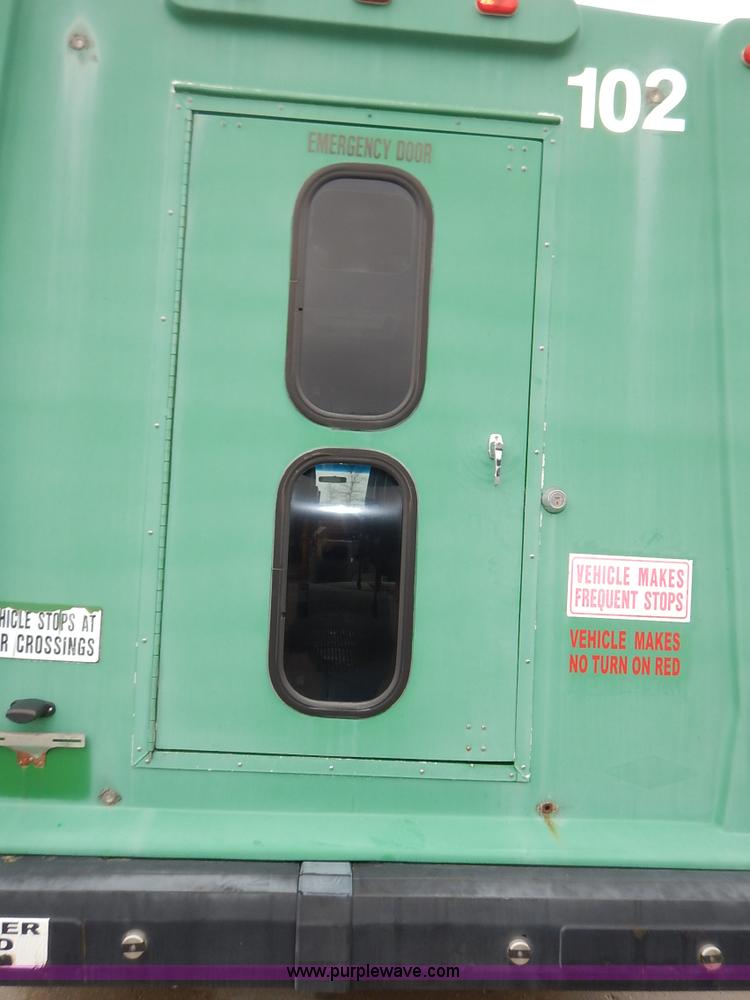 image for item J3987 2003 Ford 801 transit bus