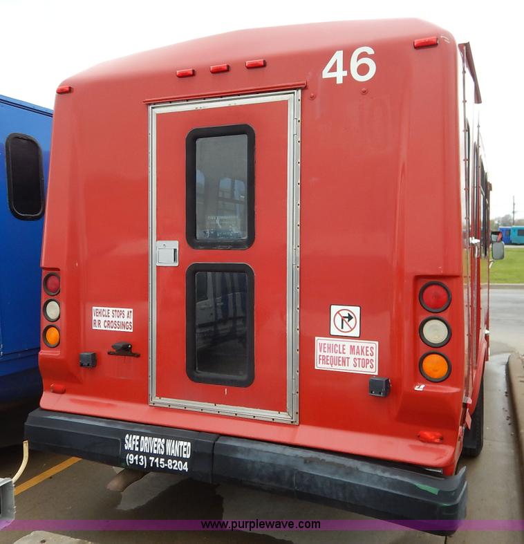 image for item J3990 2000 Ford 801 transit bus