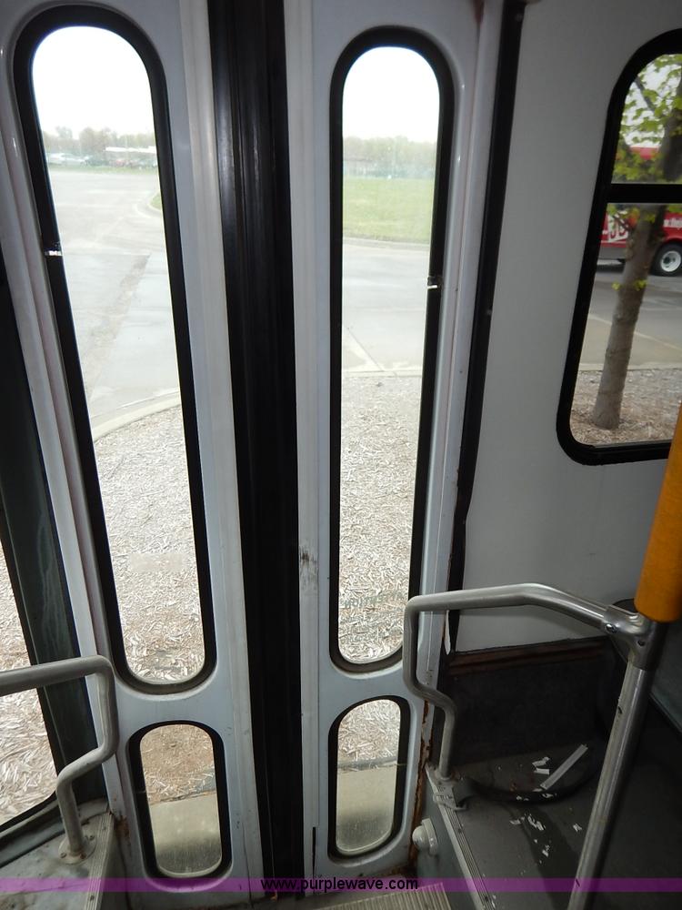 image for item J3990 2000 Ford 801 transit bus