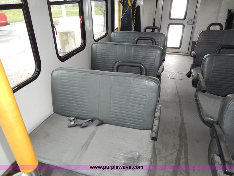 image for item J3990 2000 Ford 801 transit bus