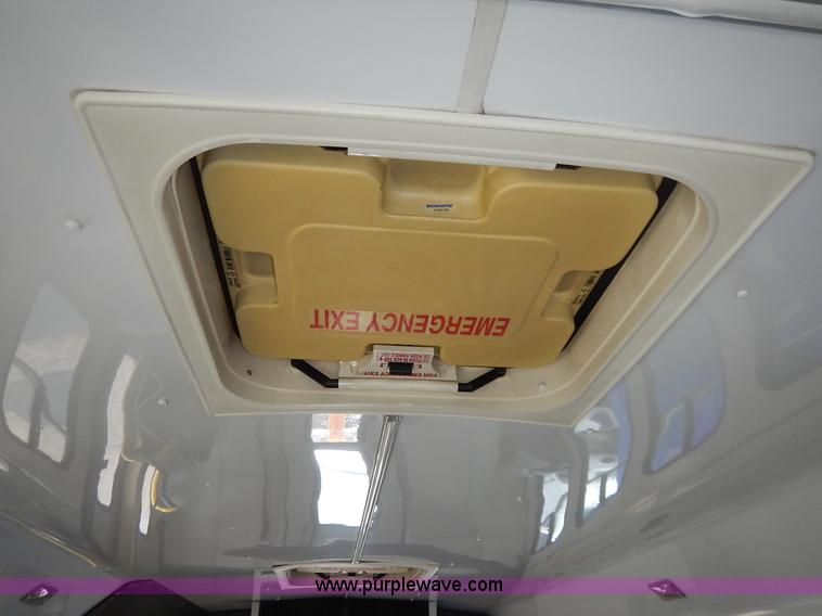 image for item J3990 2000 Ford 801 transit bus