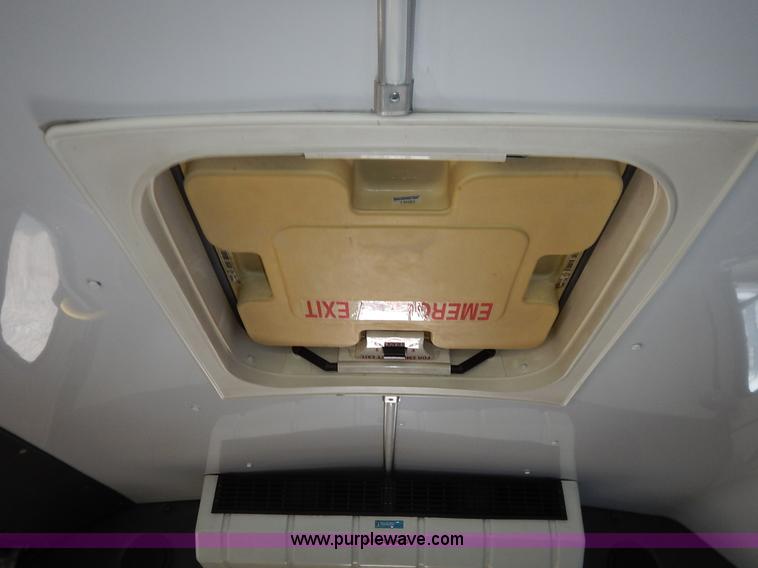 image for item J3990 2000 Ford 801 transit bus