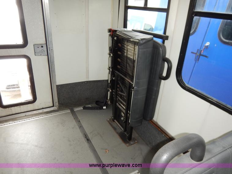 image for item J3990 2000 Ford 801 transit bus