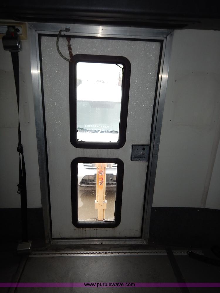 image for item J3990 2000 Ford 801 transit bus