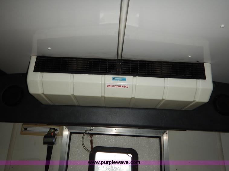 image for item J3990 2000 Ford 801 transit bus