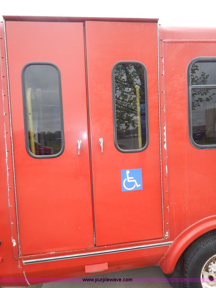 image for item J3990 2000 Ford 801 transit bus