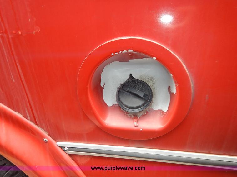 image for item J3990 2000 Ford 801 transit bus