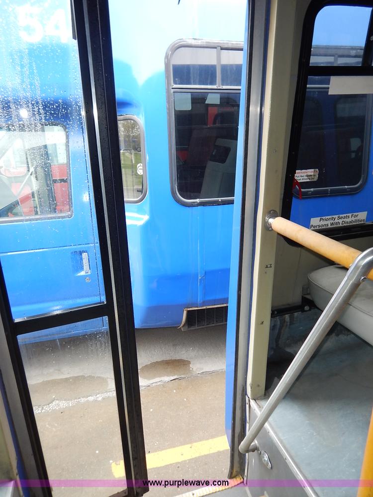 image for item J3991 2003 Ford 801 transit bus