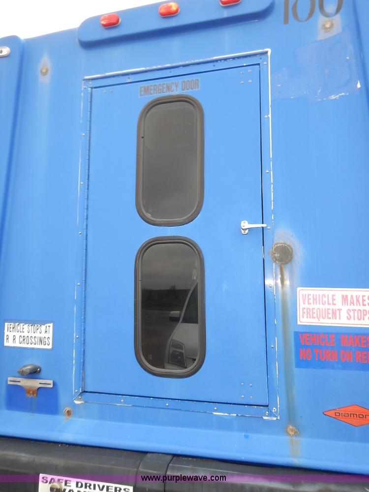 image for item J3991 2003 Ford 801 transit bus