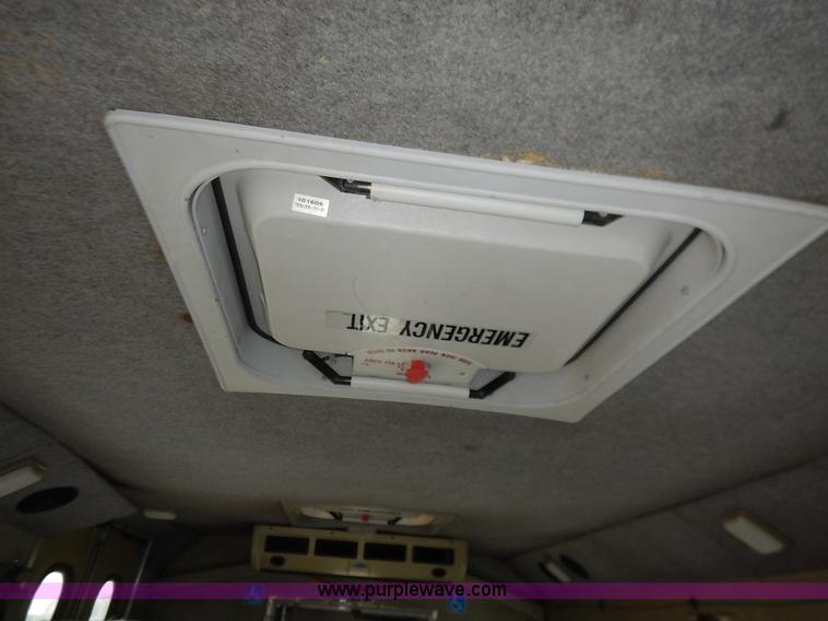 image for item J3992 2003 Ford 801 transit bus