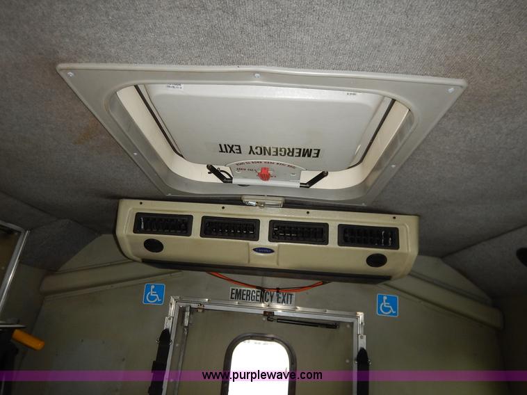 image for item J3992 2003 Ford 801 transit bus