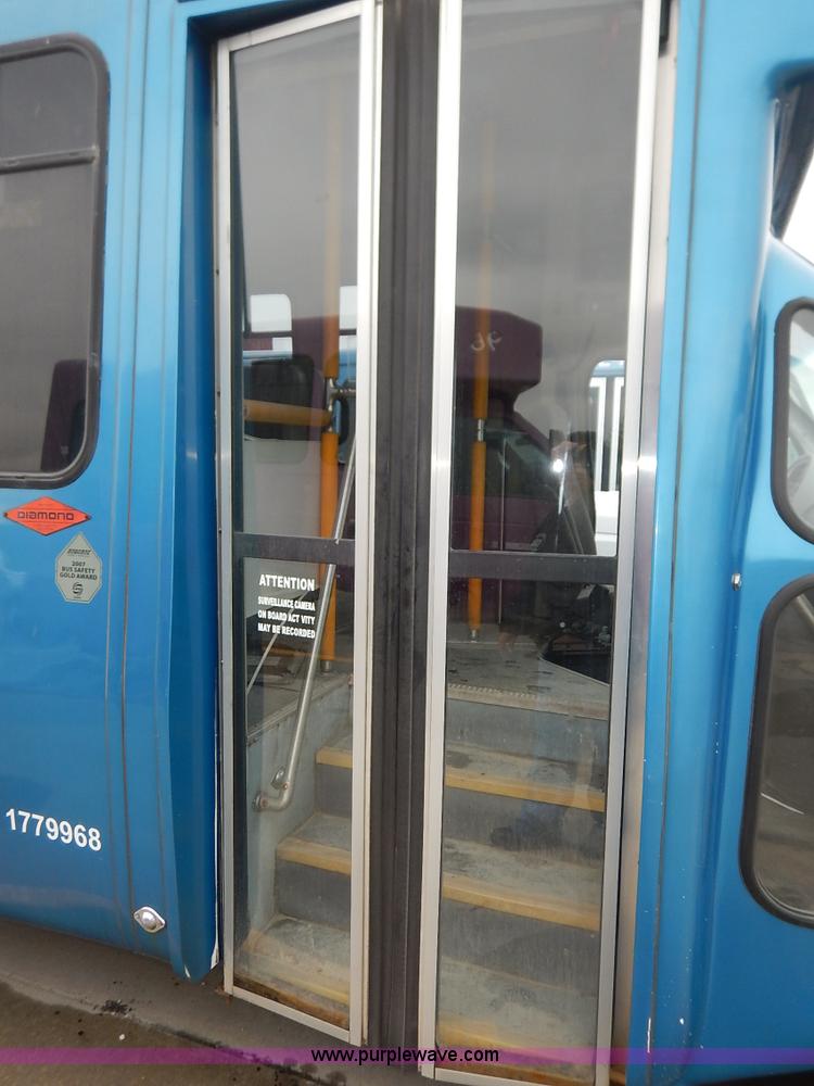 image for item J3992 2003 Ford 801 transit bus