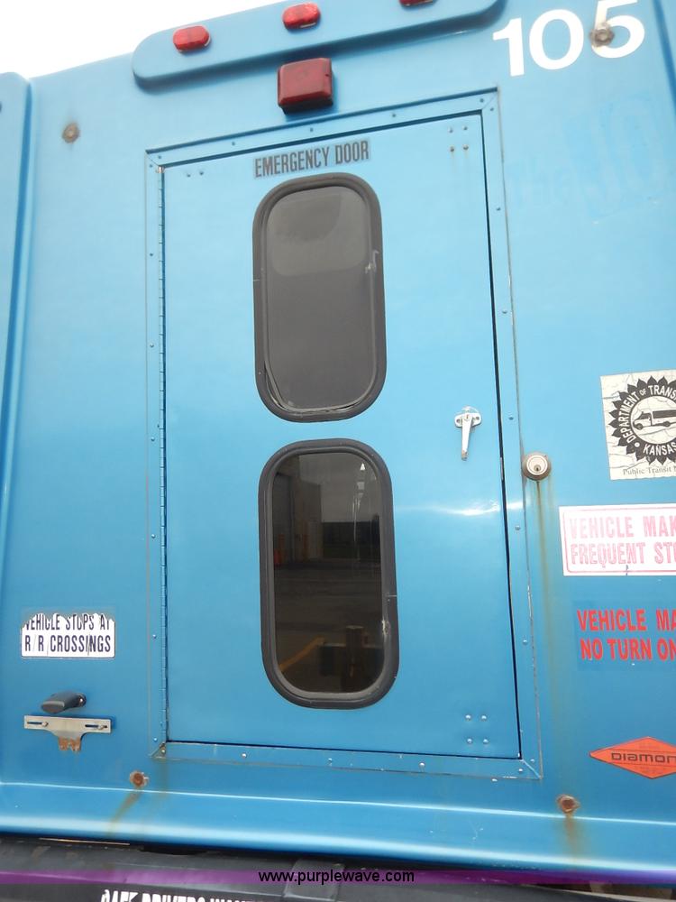 image for item J3992 2003 Ford 801 transit bus